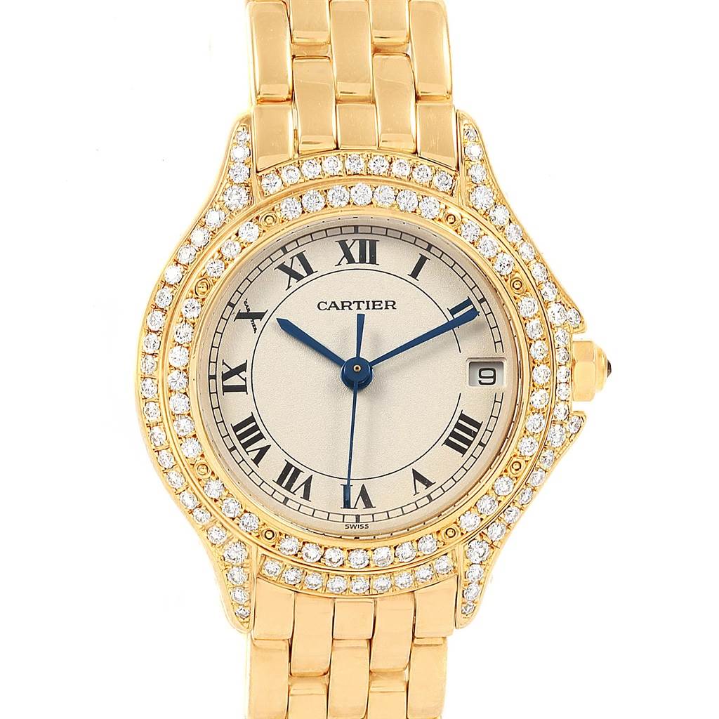 This image shows a frontal view of the Panthere model by Cartier, displaying its gold band, diamond bezel, and Roman numeral dial.