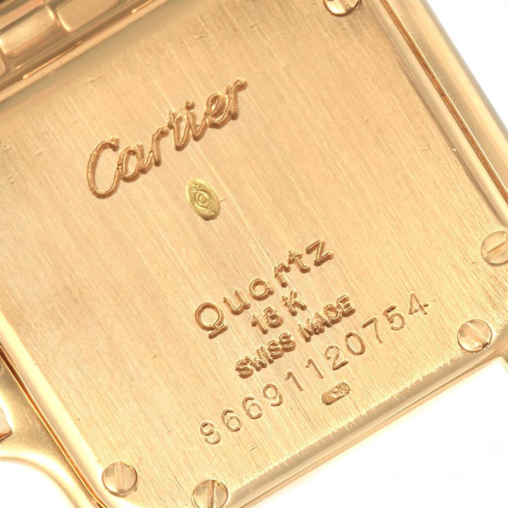 The image shows the back of a Cartier Panthere WF3070B9 Women's Yellow Gold Beige Dial WF3070B9 Women's Yellow Gold Beige Dial watch in close-up, highlighting brand engraving and specifications.