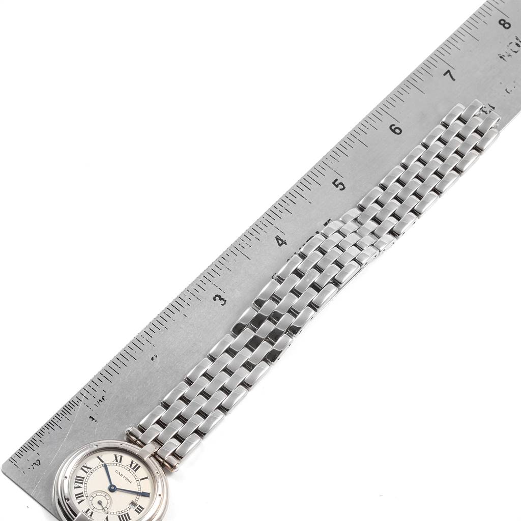 The image shows the side angle of a Cartier Panthere 0029 Women
s White Gold Silver Dial 0029 Women
s White Gold Silver Dial watch, highlighting its face and metal bracelet, with a ruler for scale.