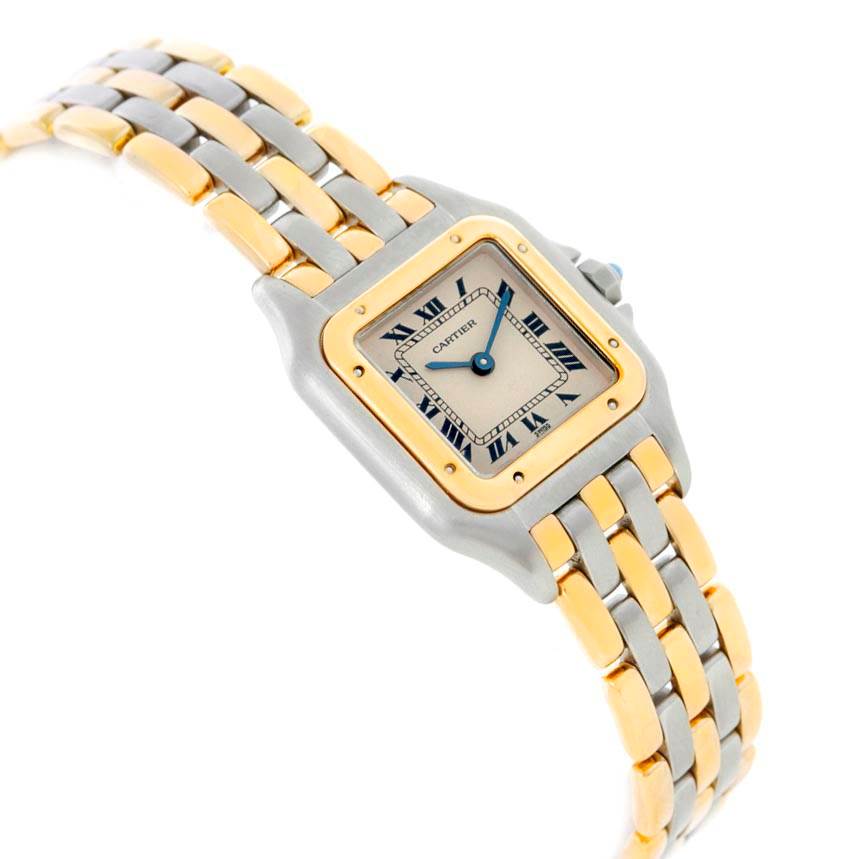 This image shows a Cartier Panthère watch from an angled top view, highlighting the face and part of the two-tone band.