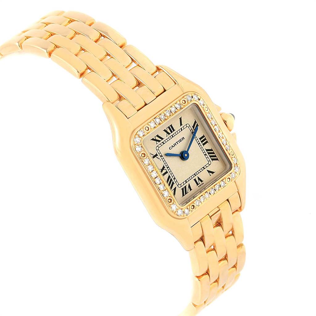 This image shows a Cartier Panthere WF3070B9 Women's Yellow Gold Beige Dial WF3070B9 Women's Yellow Gold Beige Dial watch at an angle highlighting its gold bracelet and diamond-encrusted square face.