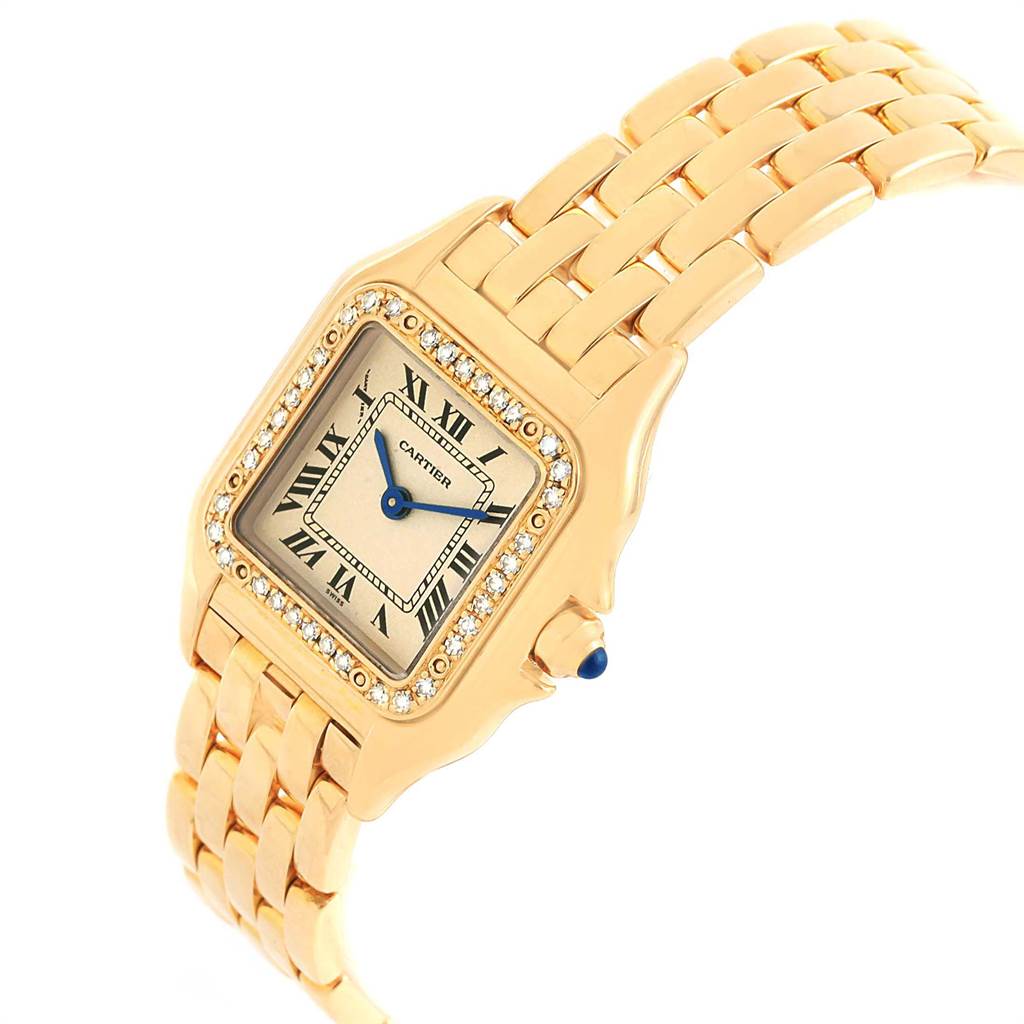 The image shows a Cartier Panthere WF3070B9 Women's Yellow Gold Beige Dial WF3070B9 Women's Yellow Gold Beige Dial watch from an angle highlighting its square face, diamond bezel, and gold bracelet.