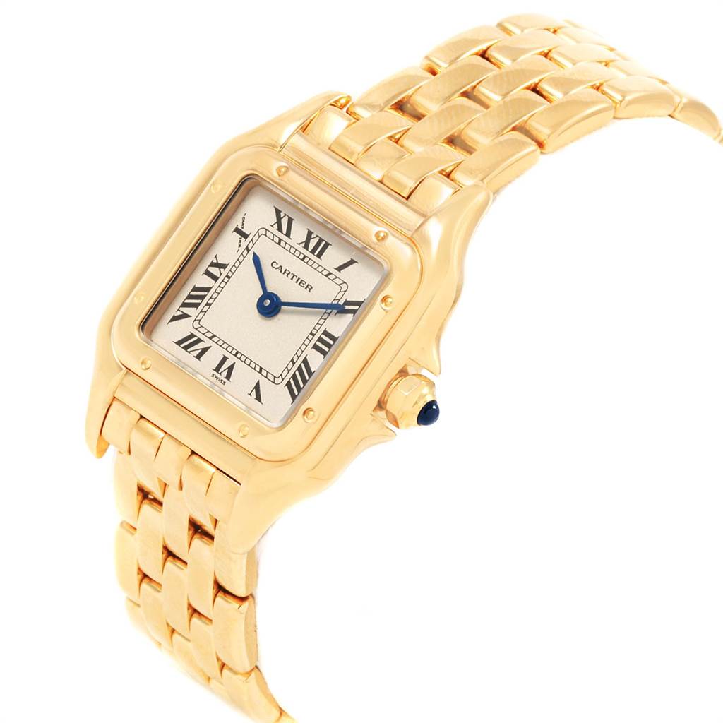 The Cartier Panthere W25022B9 Women's Yellow Gold Silver Dial W25022B9 Women's Yellow Gold Silver Dial watch is shown at a slight angle, highlighting its square face, crown, and gold bracelet.