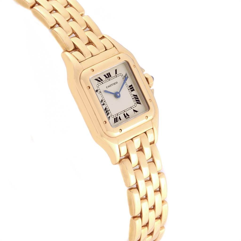The Cartier Panthere W25022B9 Women's Yellow Gold Silver Dial W25022B9 Women's Yellow Gold Silver Dial watch is shown at a slight angle, displaying its gold bracelet and square face with Roman numerals.