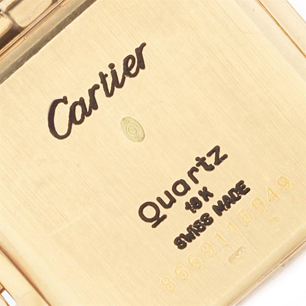 The image shows the back case of a Panthere model watch by Cartier, featuring the brand name, movement type, and material details.