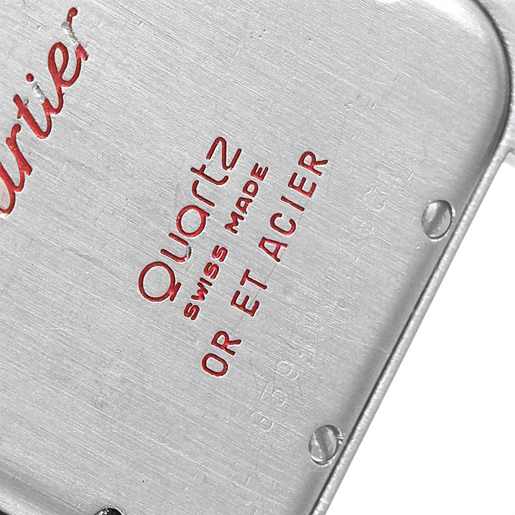 This image shows a close-up of the back case of a Cartier Panthere W25028B8 Steel and Gold (two tone) Silver Dial W25028B8 Steel and Gold (two tone) Silver Dial Quartz watch, highlighting the inscriptions.