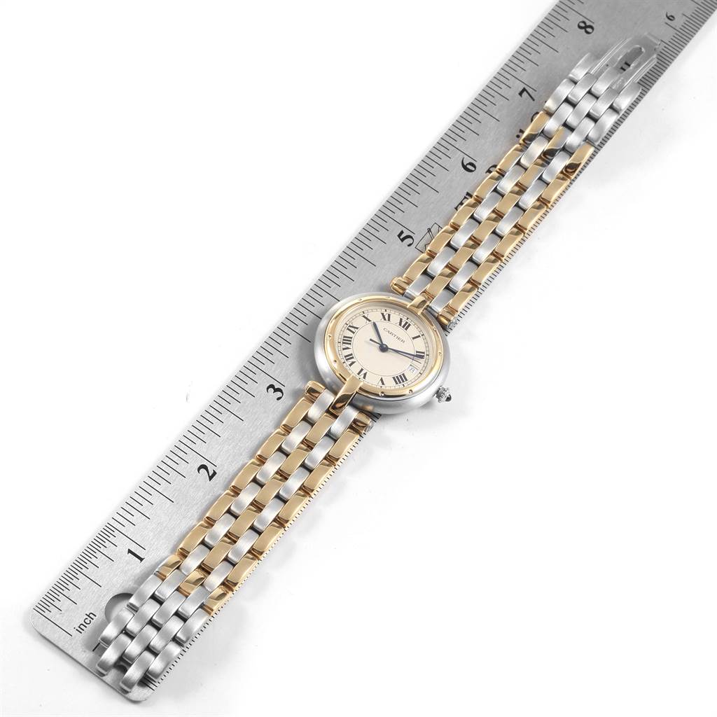 The Cartier Vendome 183964 Women's Steel and Gold (two tone) Silver Dial 183964 Women's Steel and Gold (two tone) Silver Dial model watch is shown flat, with its face and multicolor metal bracelet measured by a ruler.