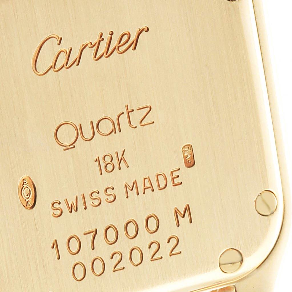 This image shows the case back of a Cartier Panthère watch, highlighting markings like "Cartier," "Quartz," "18K," and "Swiss Made."