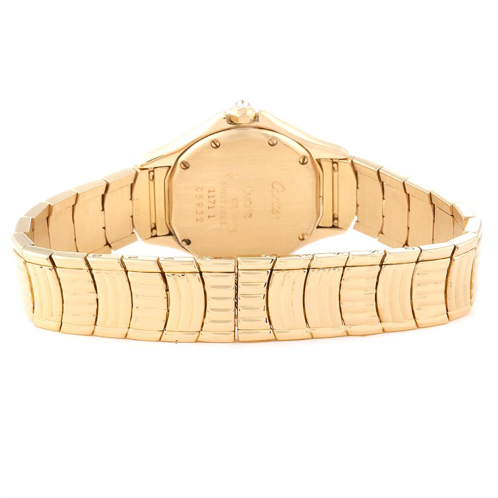 The image shows the back view of a Panthere model by Cartier, highlighting the case back and the gold bracelet.