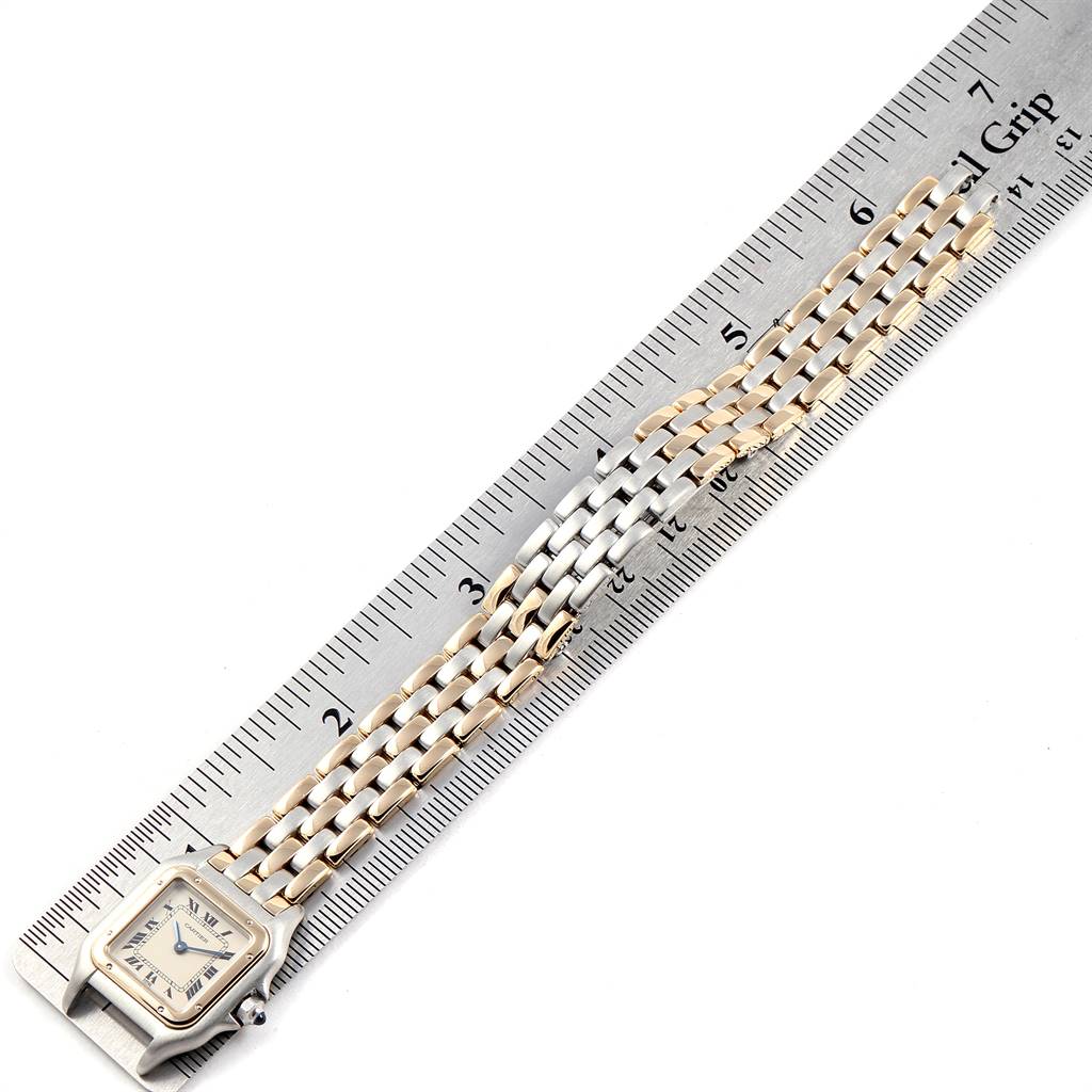 The image shows a Cartier Panthere W25029B6 Women's Stainless Steel Beige Dial W25029B6 Women's Stainless Steel Beige Dial watch with the face and band laid flat next to a ruler for measurement.