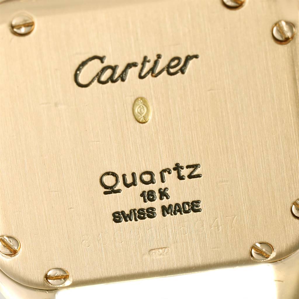 This is a close-up shot of the back of a Cartier Panthere W25022B9 Women's Yellow Gold Silver Dial W25022B9 Women's Yellow Gold Silver Dial Quartz watch.