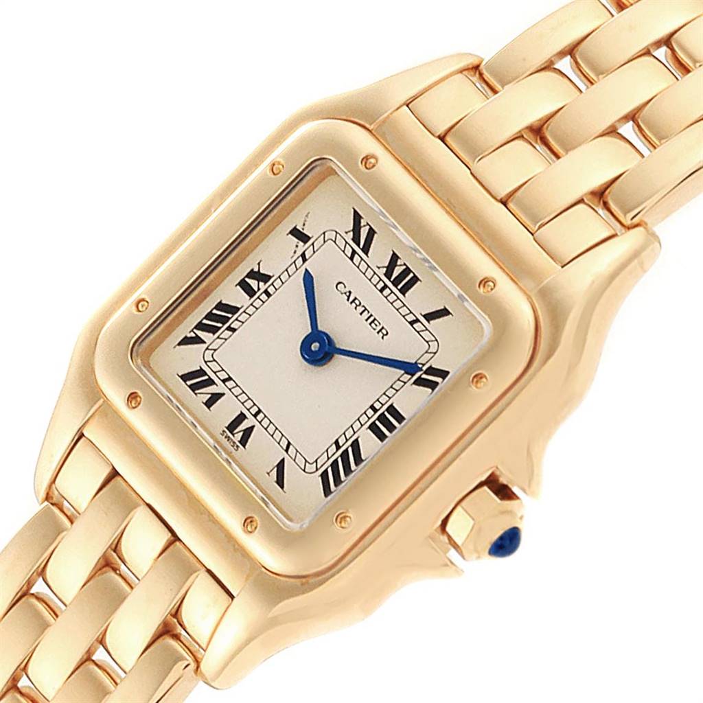 The image shows a gold Cartier Panthere W25022B9 Women's Yellow Gold Silver Dial W25022B9 Women's Yellow Gold Silver Dial watch at an angle, highlighting its dial, Roman numerals, and part of the bracelet.