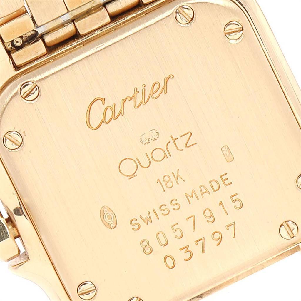 The image shows the back case of a Cartier Panthere WF3072B9 Women's Yellow Gold Beige Dial WF3072B9 Women's Yellow Gold Beige Dial watch, highlighting its engravings and part of the bracelet.