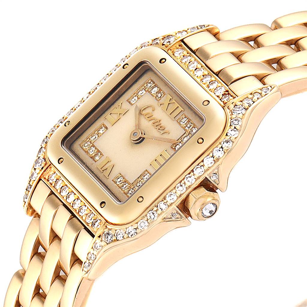 The image shows a close-up of a Cartier Panthere WF3072B9 Women's Yellow Gold Beige Dial WF3072B9 Women's Yellow Gold Beige Dial watch at an angle highlighting the face, bezel, and part of the bracelet.