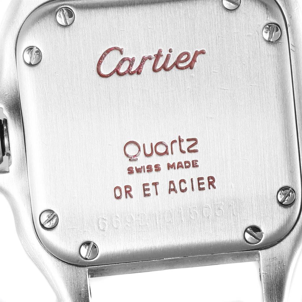 The image shows the back case of a Cartier Panthere W25029B6 Women's Stainless Steel Beige Dial W25029B6 Women's Stainless Steel Beige Dial watch, highlighting the brand and model information and screws.