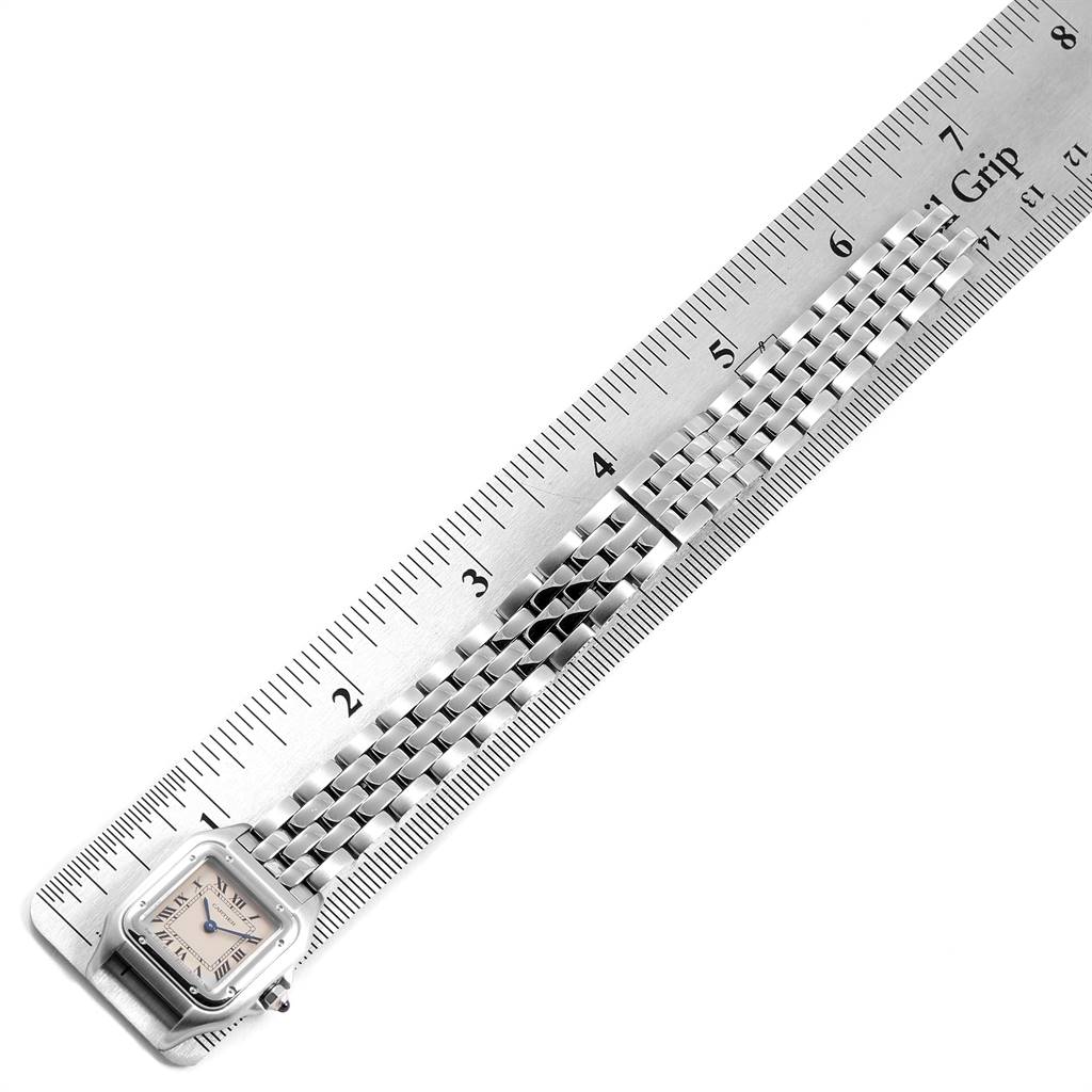 The Cartier Panthere W25033P5 Women
s Stainless Steel Silver Dial W25033P5 Women
s Stainless Steel Silver Dial watch is shown from an angled top view, focusing on the case and the linked bracelet against a ruler.