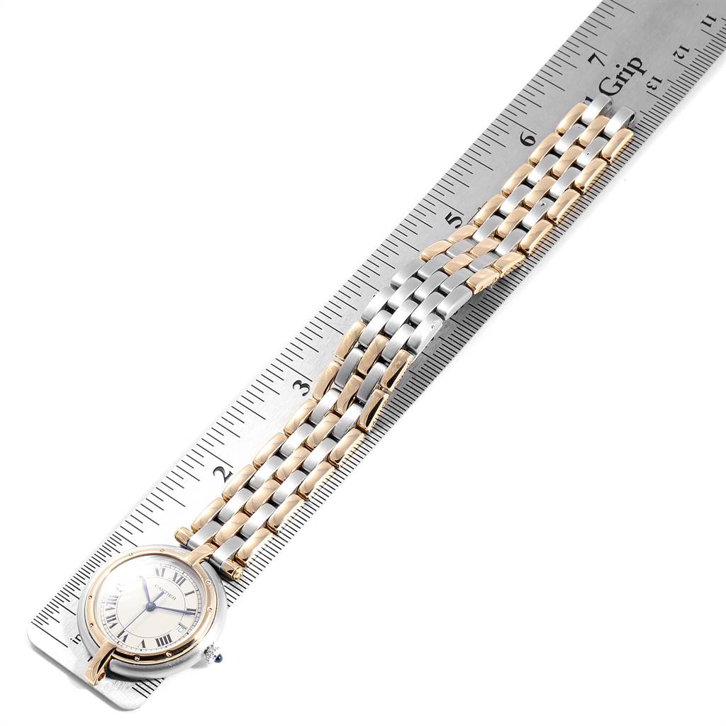 The Cartier Vendome 183964 Women's Steel and Gold (two tone) Silver Dial 183964 Women's Steel and Gold (two tone) Silver Dial watch is shown from an overhead angle, displaying the face and part of the strap against a ruler for scale.