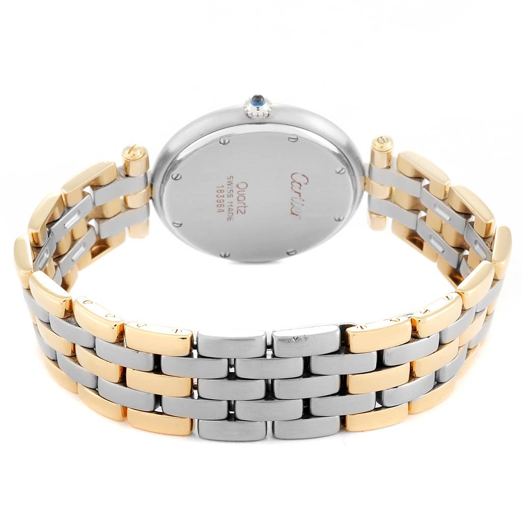 This image shows the back case and bracelet of the Vendome model by Cartier, highlighting the metal links and crown.