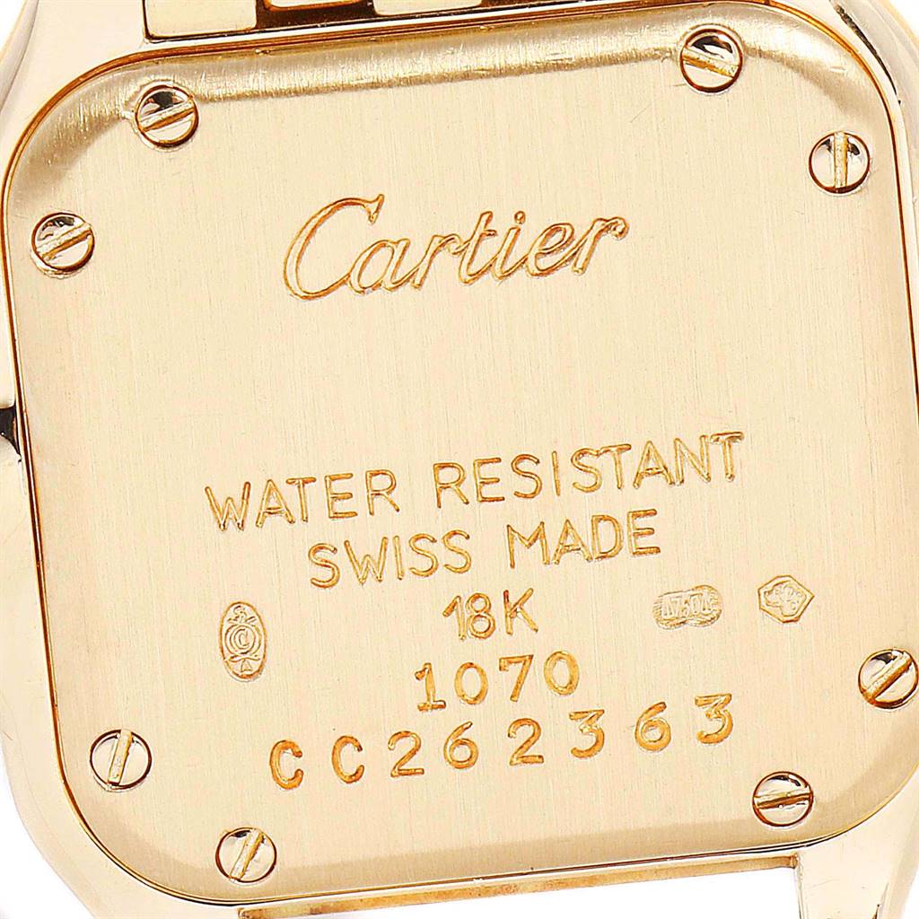 This image shows the back case of the Cartier Panthere W25022B9 Women's Yellow Gold Silver Dial W25022B9 Women's Yellow Gold Silver Dial model watch, displaying engravings and screws.