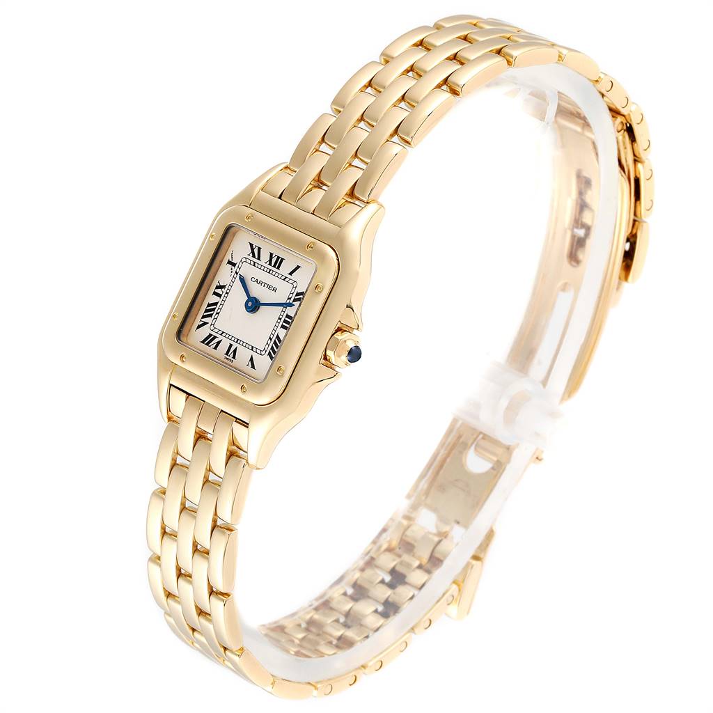 The image shows a close-up angled view of a Panthere model by Cartier, displaying the gold bracelet and watch face.