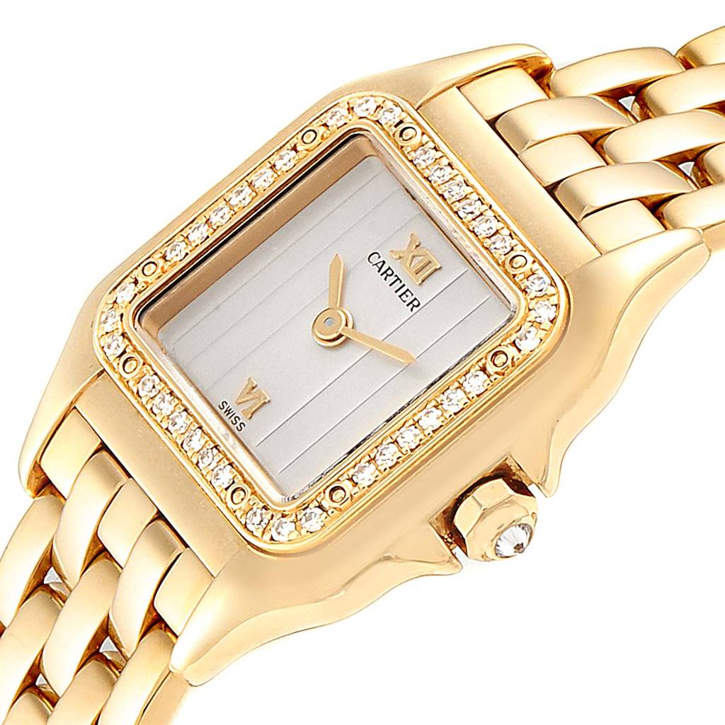 The image shows the Cartier Panthère watch's face, bezel, crown, and part of the bracelet from an angled perspective.