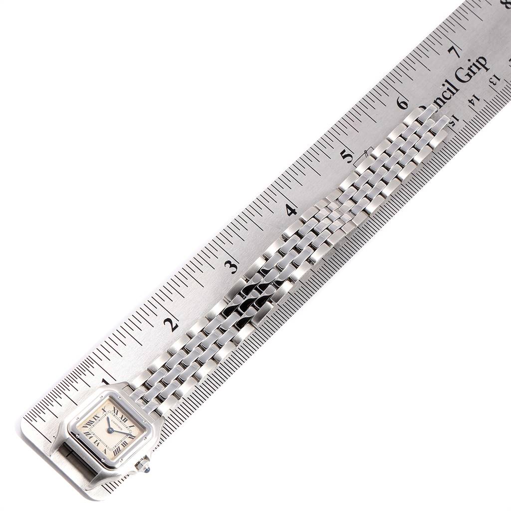 This image shows the band and face of a Cartier Panthere W25033P5 Women
s Stainless Steel Silver Dial W25033P5 Women
s Stainless Steel Silver Dial watch placed against a ruler for measurement.