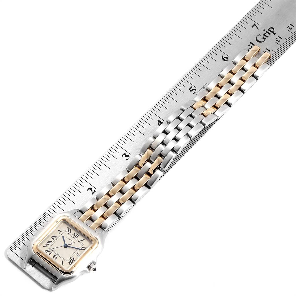 The image shows the face and partial band of the Cartier Panthere 187957 Steel and Gold (two tone) Silver Dial 187957 Steel and Gold (two tone) Silver Dial model watch, with a ruler for size reference.