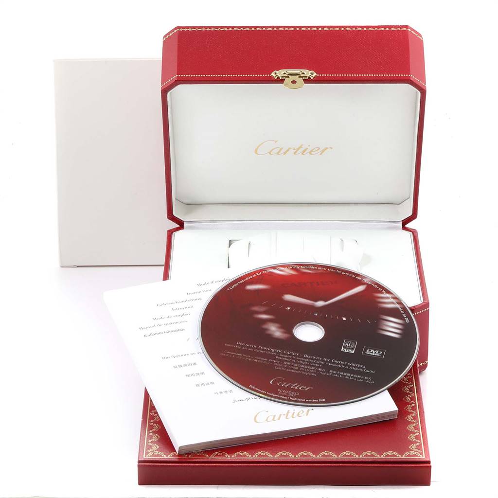 The image shows a Cartier Panthere 1131 Women's Yellow Gold Silver Dial 1131 Women's Yellow Gold Silver Dial model watch box and accessories, including a DVD and paperwork, viewed frontally.