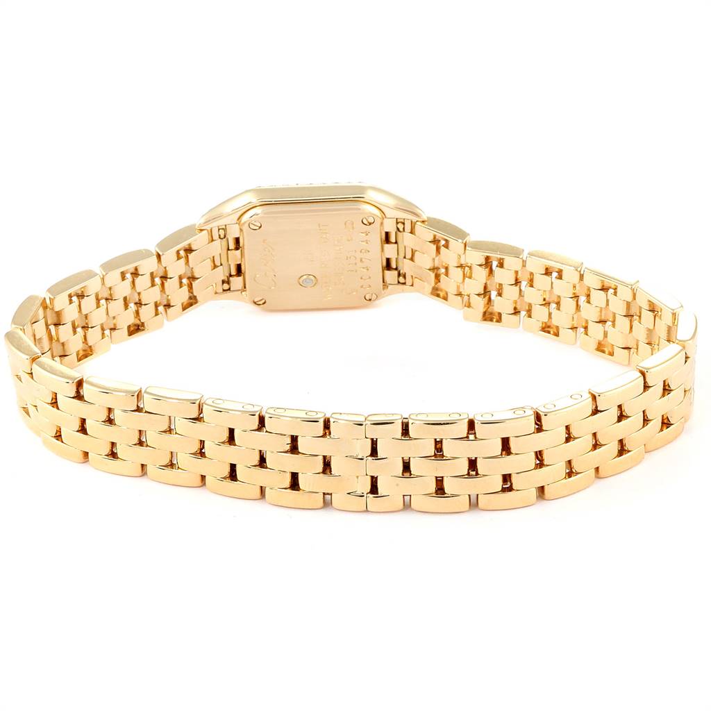 This image shows the back of the gold bracelet and case of a Cartier Panthere 1131 Women's Yellow Gold Silver Dial 1131 Women's Yellow Gold Silver Dial watch.