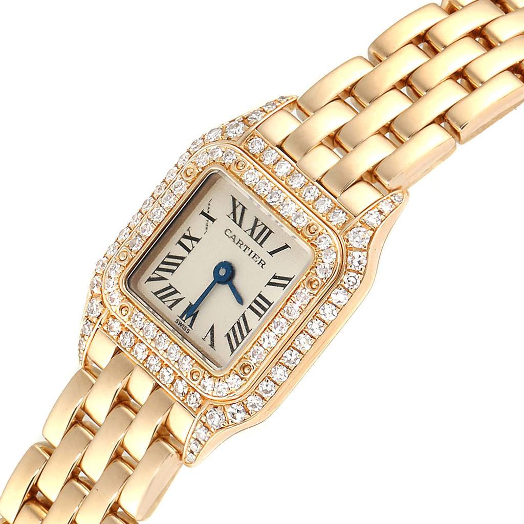 The image shows a close-up of the Cartier Panthere 1131 Women's Yellow Gold Silver Dial 1131 Women's Yellow Gold Silver Dial watch, highlighting the face, bezel, and upper bracelet links.