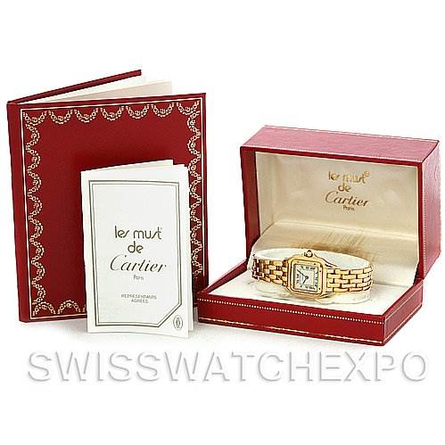 The image shows the Panthere model by Cartier with its red box and warranty booklet, viewed from an angled top perspective.