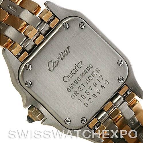 This image shows the back case and part of the bracelet of the Panthere model by Cartier, highlighting the inscriptions.