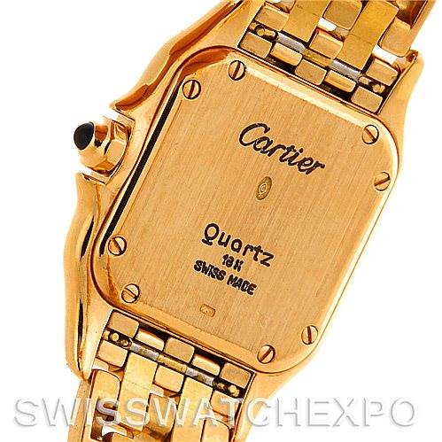 This image shows the back case and part of the bracelet of a Cartier Panthere W25022B9 Women's Yellow Gold Silver Dial W25022B9 Women's Yellow Gold Silver Dial Quartz watch, with visible inscriptions and screws.