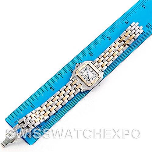 This image shows a Cartier Panthere W25029B6 Women
s Stainless Steel Silver Dial W25029B6 Women
s Stainless Steel Silver Dial model watch, laying flat next to a blue ruler for size reference.