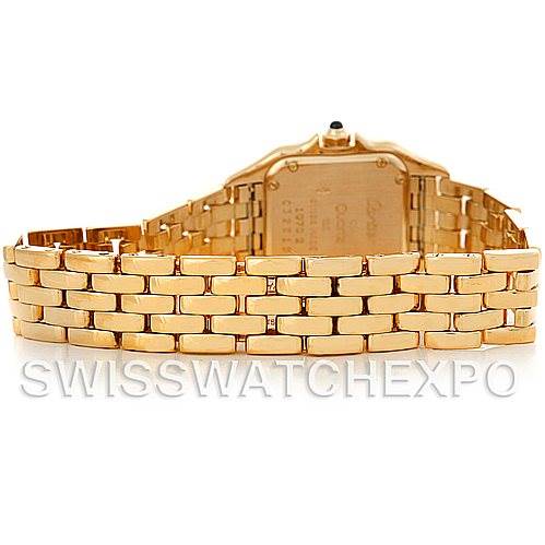 The image shows the back view of a Cartier Panthere W25022B9 Women's Yellow Gold Silver Dial W25022B9 Women's Yellow Gold Silver Dial watch, focusing on the case back and gold bracelet links.