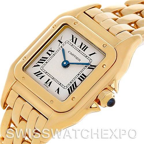 The image shows a close-up angle of the Cartier Panthere W25022B9 Women's Yellow Gold Silver Dial W25022B9 Women's Yellow Gold Silver Dial watch, highlighting its square face, gold case, and bracelet.