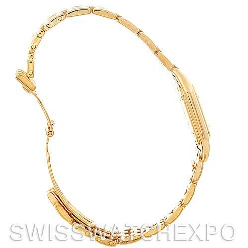This image shows a side profile of a gold Cartier Panthere W25022B9 Women
s Yellow Gold Silver Dial W25022B9 Women
s Yellow Gold Silver Dial watch, focusing on the band
s links and clasp.