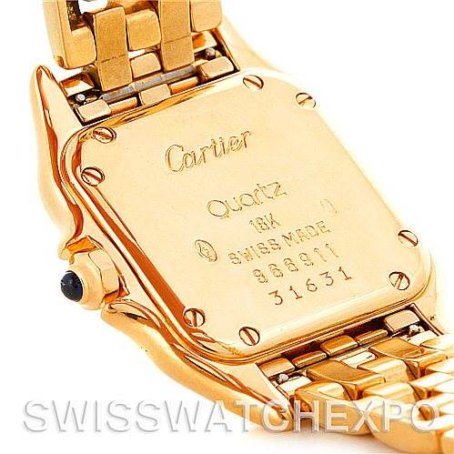 The image shows the back and part of the bracelet of a Cartier Panthere W25022B9 Women
s Yellow Gold Silver Dial W25022B9 Women
s Yellow Gold Silver Dial watch, highlighting its engravings and gold finish.