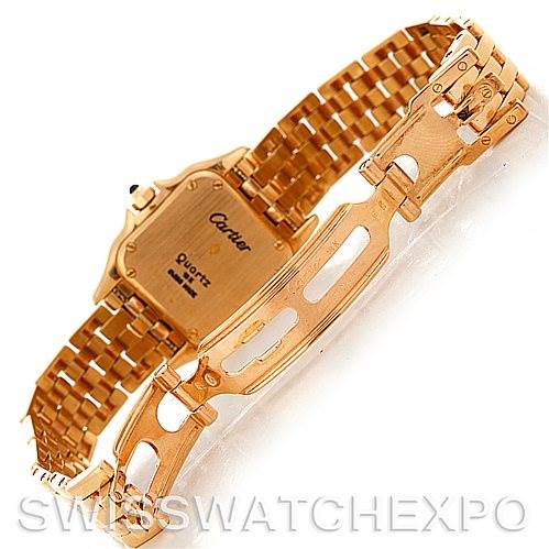 This image shows the back and clasp of a Panthere model watch by Cartier, focusing on the gold bracelet and engravings.