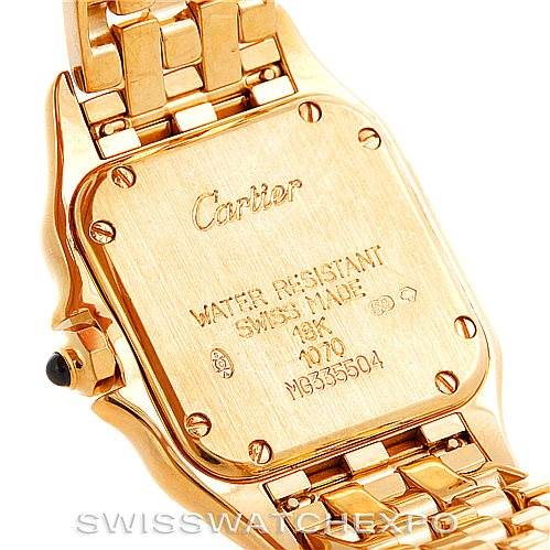 This image shows the back case and part of the bracelet of a Cartier Panthere W25022B9 Women's Yellow Gold Silver Dial W25022B9 Women's Yellow Gold Silver Dial model watch.