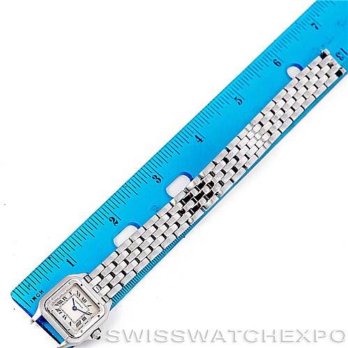 The image shows a Cartier Panthere W25033P5 Women's Stainless Steel Silver Dial W25033P5 Women's Stainless Steel Silver Dial watch laid flat beside a blue ruler, highlighting its bracelet and square watch face.