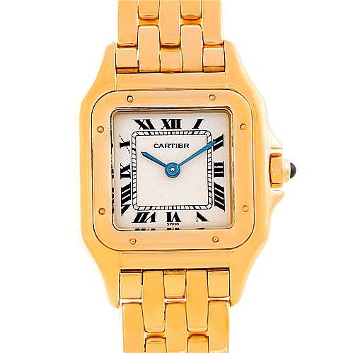 The image shows a front view of the Cartier Panthere W25022B9 Women's Yellow Gold Silver Dial W25022B9 Women's Yellow Gold Silver Dial watch, highlighting its square dial, Roman numerals, blue hands, and gold bracelet.