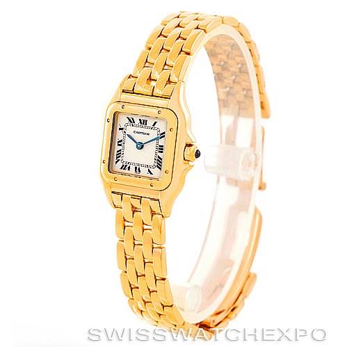 The image shows a Panthère de Cartier watch at a slight angle, highlighting its gold bracelet, square face, and distinctive blue hands.