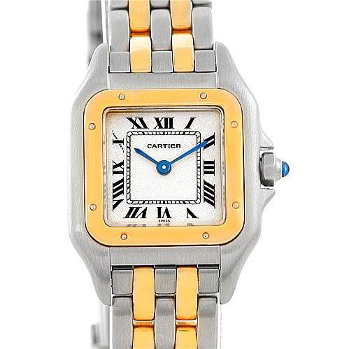 This image shows a frontal view of the Cartier Panthère watch, highlighting its square dial, Roman numeral indices, two-tone bracelet, and blue sapphire crown.