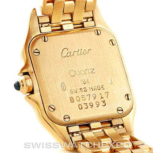 The image shows the back case and bracelet of a Panthere model by Cartier, including the inscriptions and details.
