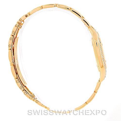 The image shows a Cartier Panthere W25022B9 Women's Yellow Gold Mother of Pearl Dial W25022B9 Women's Yellow Gold Mother of Pearl Dial watch from a side angle, highlighting its gold bracelet and side profile of the watch case.