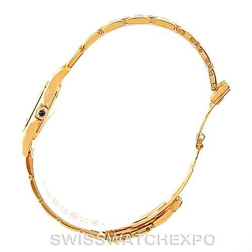 This image shows a side view of the Panthere model by Cartier, focusing on the gold bracelet and clasp.