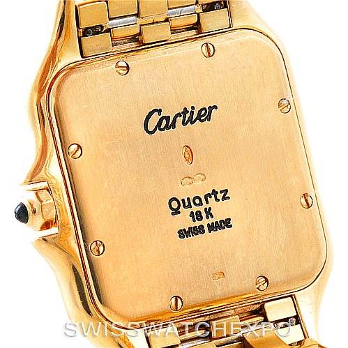This image shows the back view of a Cartier Panthere W25014B9 Men
s Yellow Gold Silver Dial W25014B9 Men
s Yellow Gold Silver Dial watch, detailing the inscription and the caseback screws.