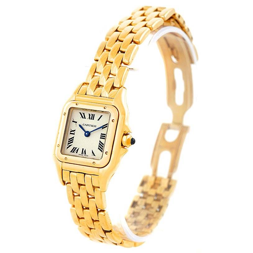 The Cartier Panthere W25022B9 Women's Yellow Gold Silver Dial W25022B9 Women's Yellow Gold Silver Dial watch is shown in a near-side angle, displaying the face, gold bracelet, and deployment clasp.