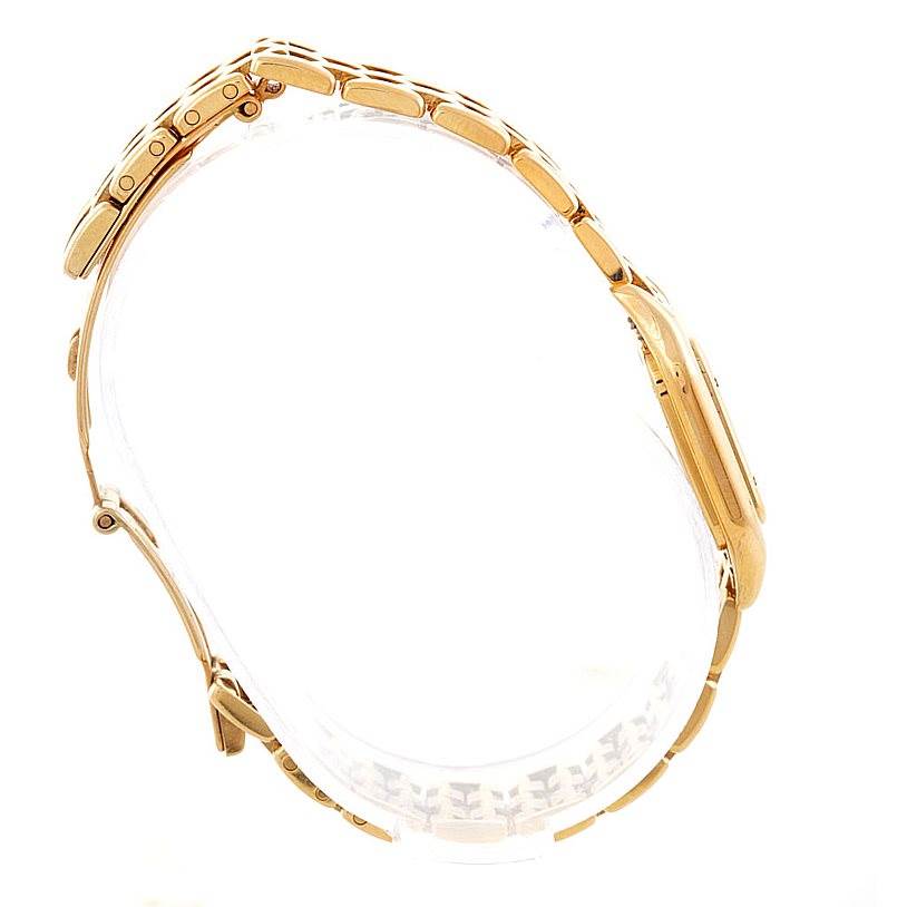 This image shows the side view of a Cartier Panthere W25022B9 Women's Yellow Gold Silver Dial W25022B9 Women's Yellow Gold Silver Dial watch, highlighting its gold bracelet and clasp.